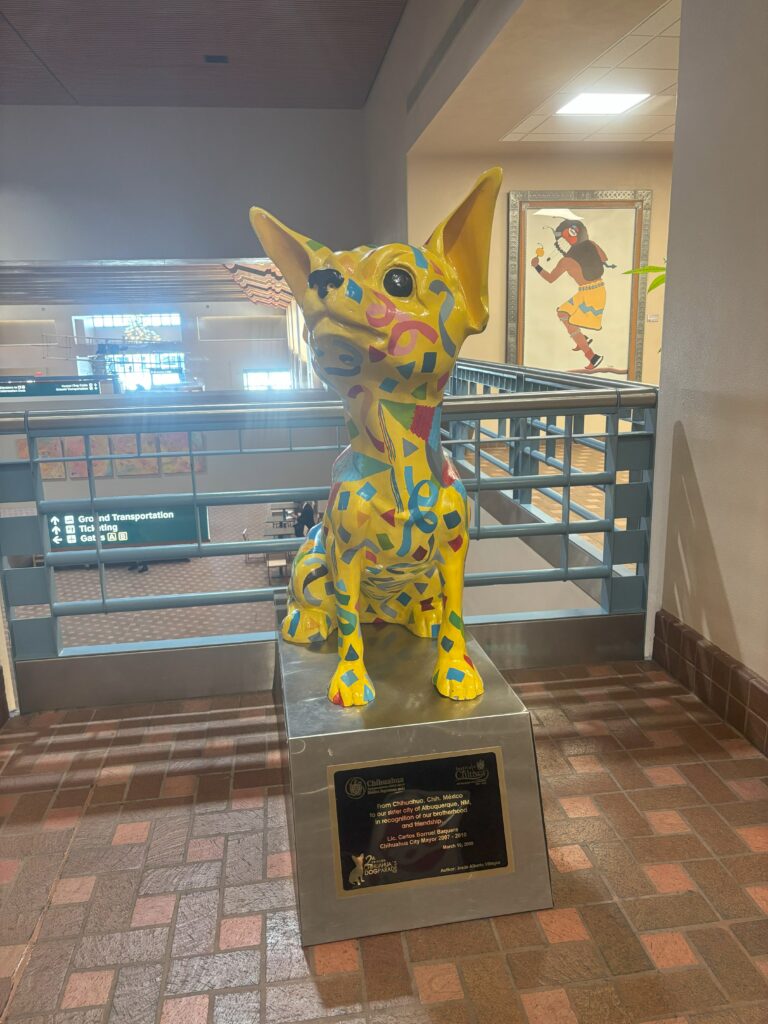 A statue of a dog at the Albuquerque International Sunport