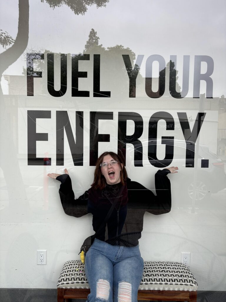 A picture of a girl sitting in front of a sign that says fuel your enegery.

Which is what you do when you have a daily Gratitude List