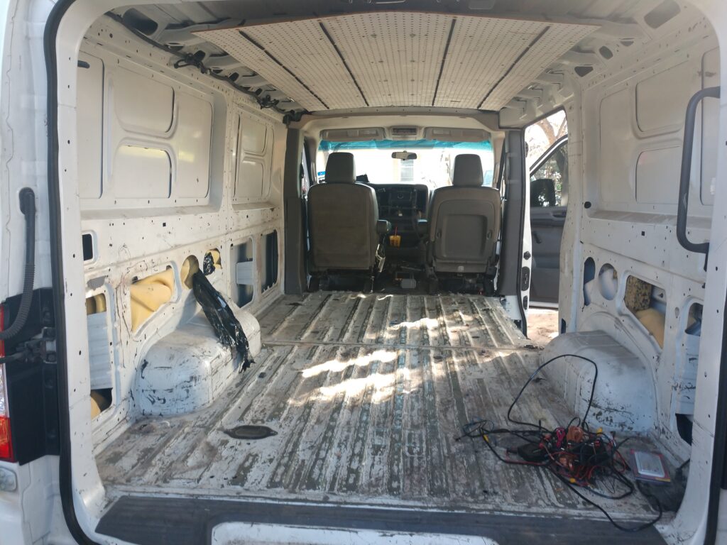 The cargo area of our NV1500 campervan before we started converting it