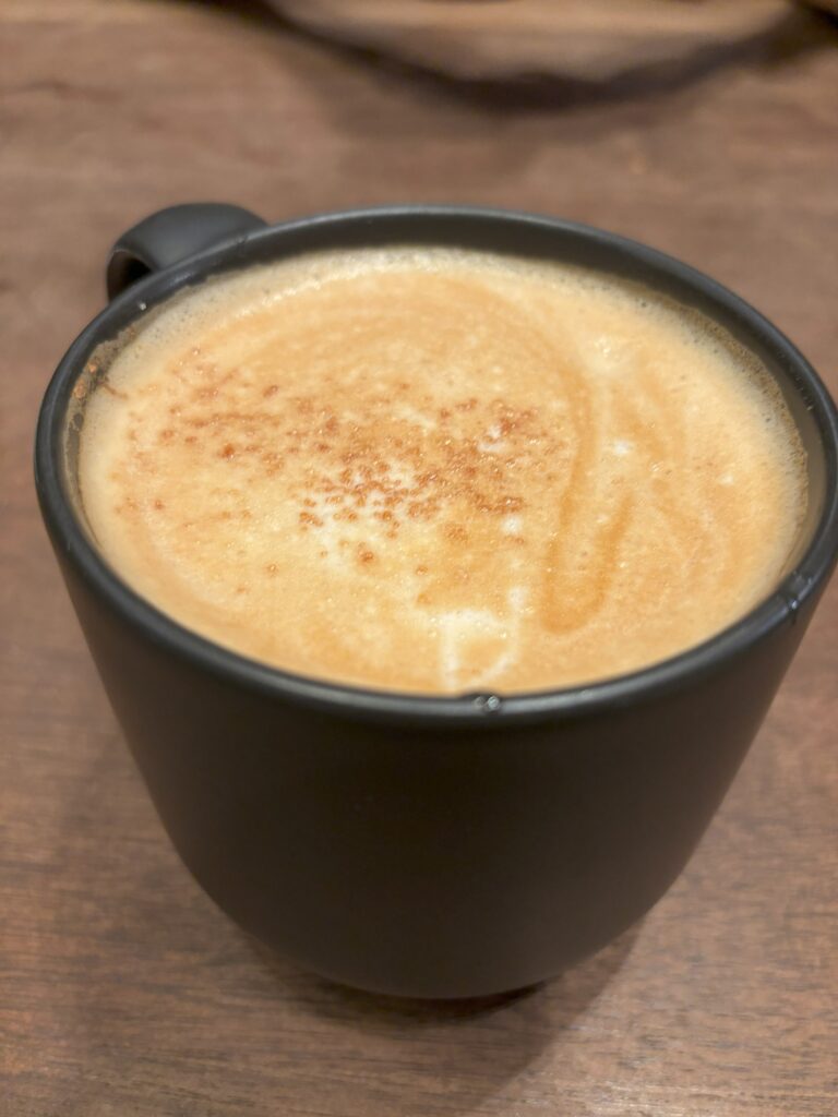 A bianco coffee in a black cup. so good!