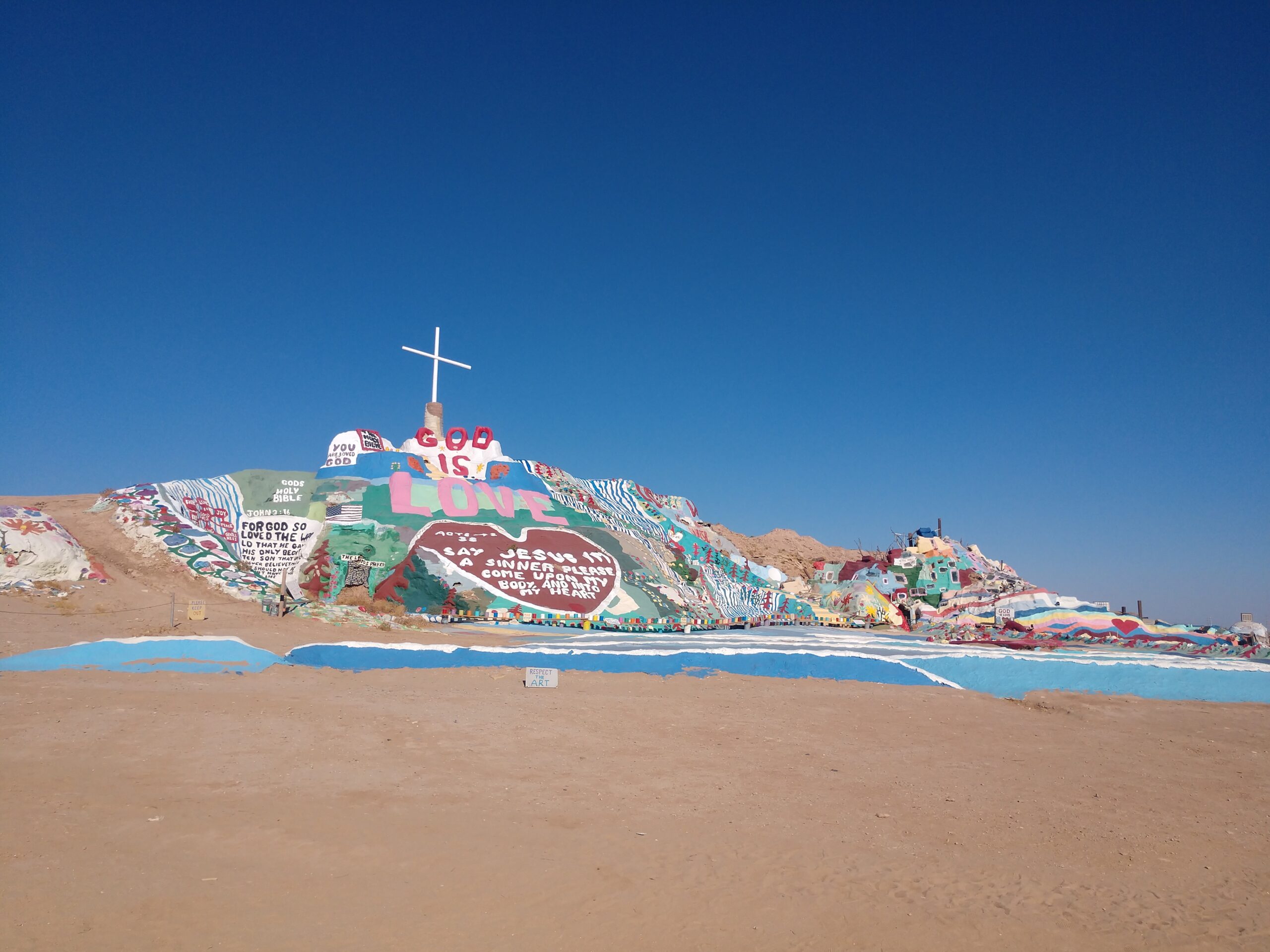 Salvation Mountain from down below visiting salvation mountain