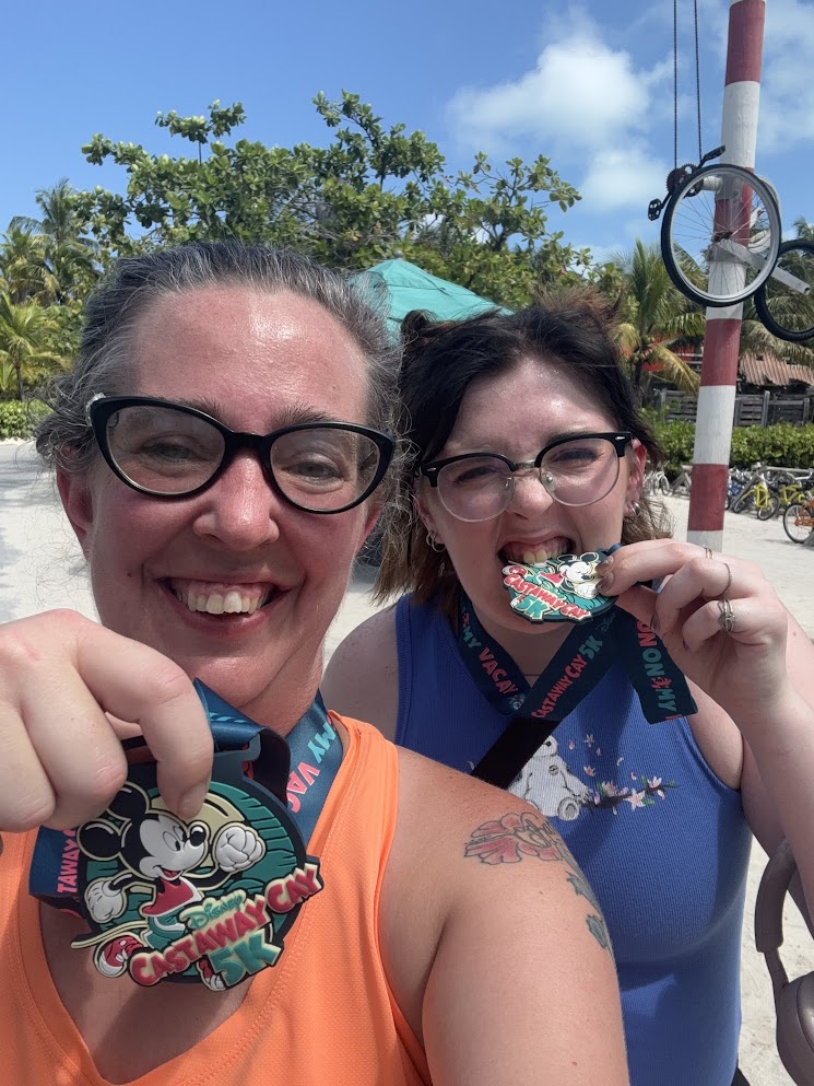 Nevaeh and I with our Castaway Cay 5K medals right after running