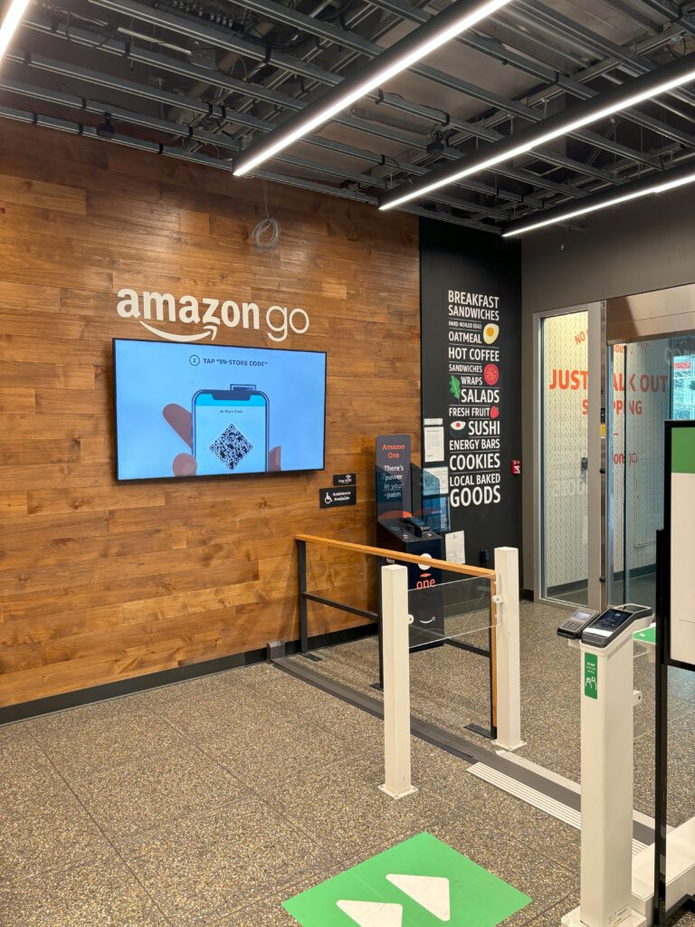 AmazonGo screen and art decor as you walk in