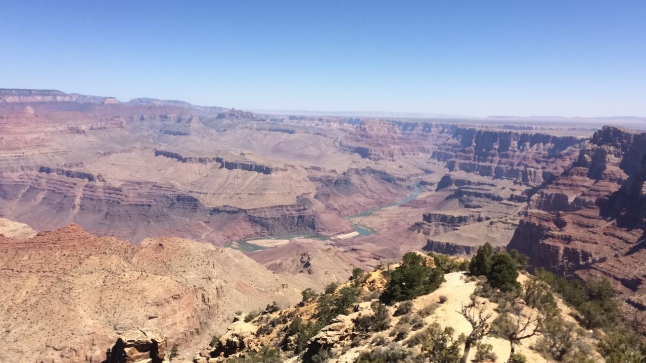 A picture of the Grand Canyon South Rim looking from a boulder