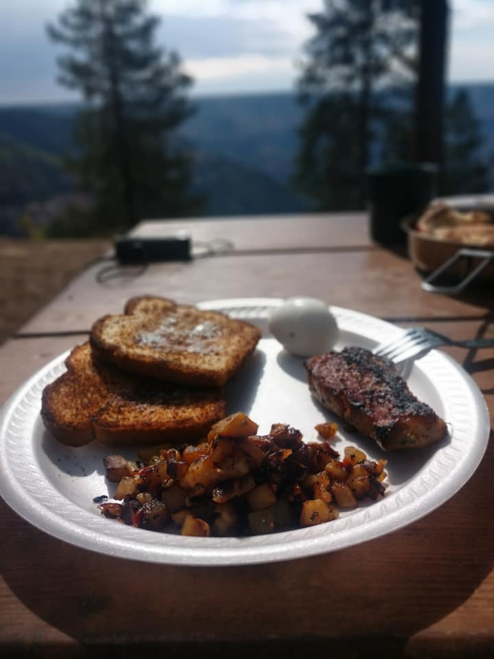 Breakfast on a styrofoam plate overlooking the Grand Canyon North Rim